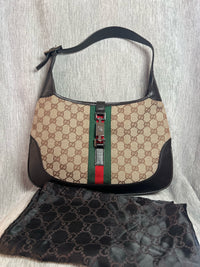Gucci Jackie Medium en Lona GG Supreme con Tribanda Web y Piel