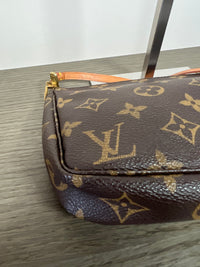 Louis Vuitton Pochette Accesoires - modelo original