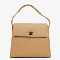 Bolso de Hombro Chanel Straight Flap en Piel de Cordero Beige con Pátina Vintage